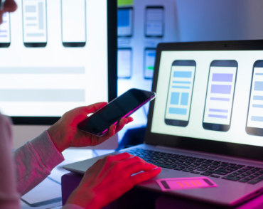 mobile developer watching at phone